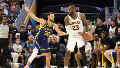LeBron James' triple-double lifts Los Angeles Lakers over Golden State Warriors in 2OT