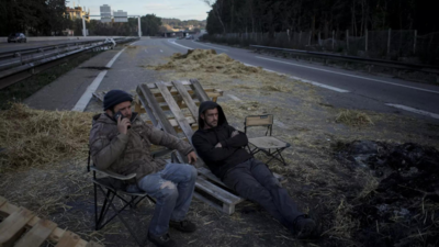 France's government prepares new measures to calm farmers' protests, with barricades squeezing Paris