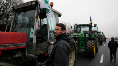 French farmers lift road blockades around Paris after the prime minister offers a support plan