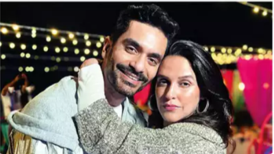 Angad Bedi: Happy Birthday Angad Bedi: Doting wife Neha Dhupia surprises him with post-workout cake cutting session | - Times of India