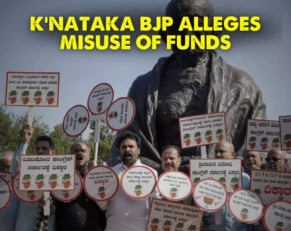 
Karnataka BJP MPs protest at Gandhi Statue in Parliament over misuse of funds by Congress-led state government
