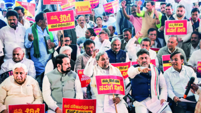 Karnataka brings fight to Delhi, says FM lying, denying funds
