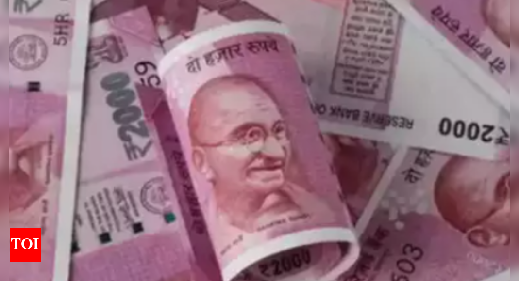 Rupee falls 7 paise to close at 83.03 against US dollar – Times of India