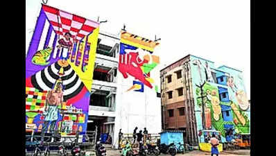 Artists give government housing buildings at Ukkadam a facelift
