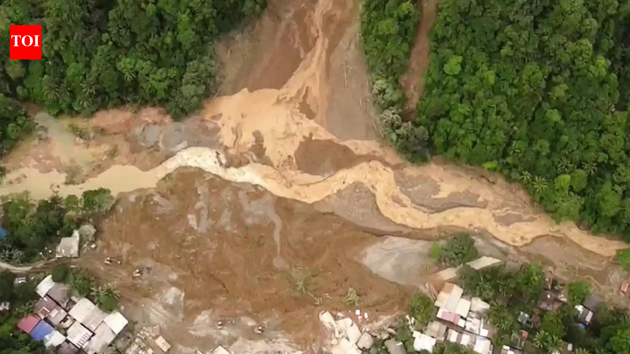 In pics: Devastating Philippines landslide kills over 60, several missing