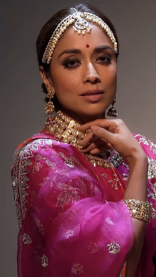 Photos] Shriya Saran stuns in peach heavy embroidered saree with