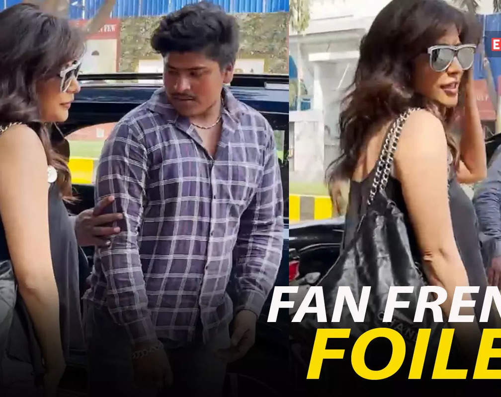 
Chitrangda Singh's driver intercepts fan from getting too close to her for photograph
