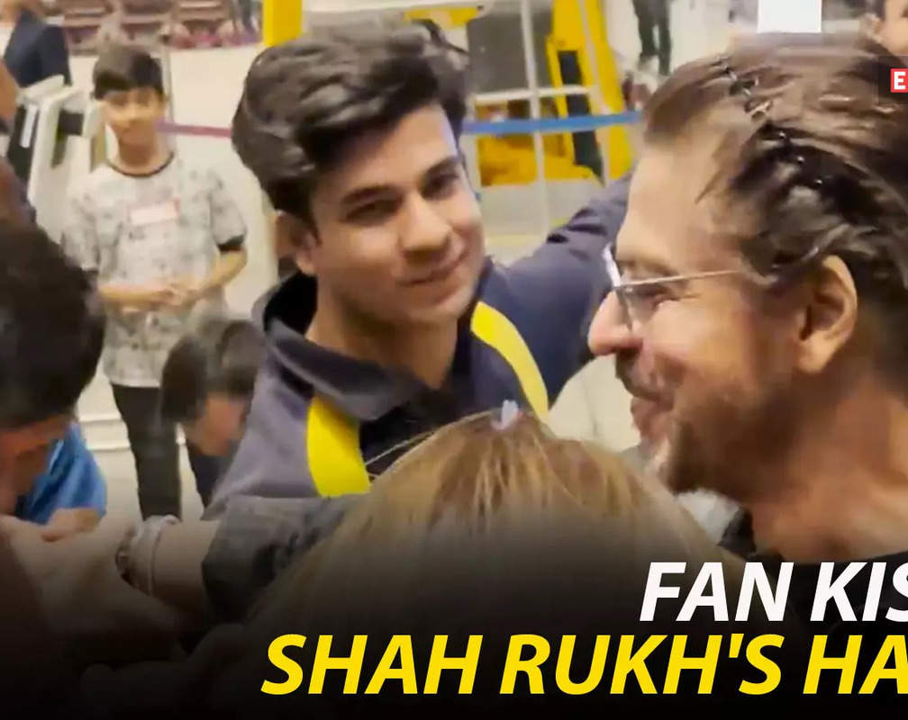 
Shah Rukh Khan's hand kissed by admirer: Airport scene breaks the internet
