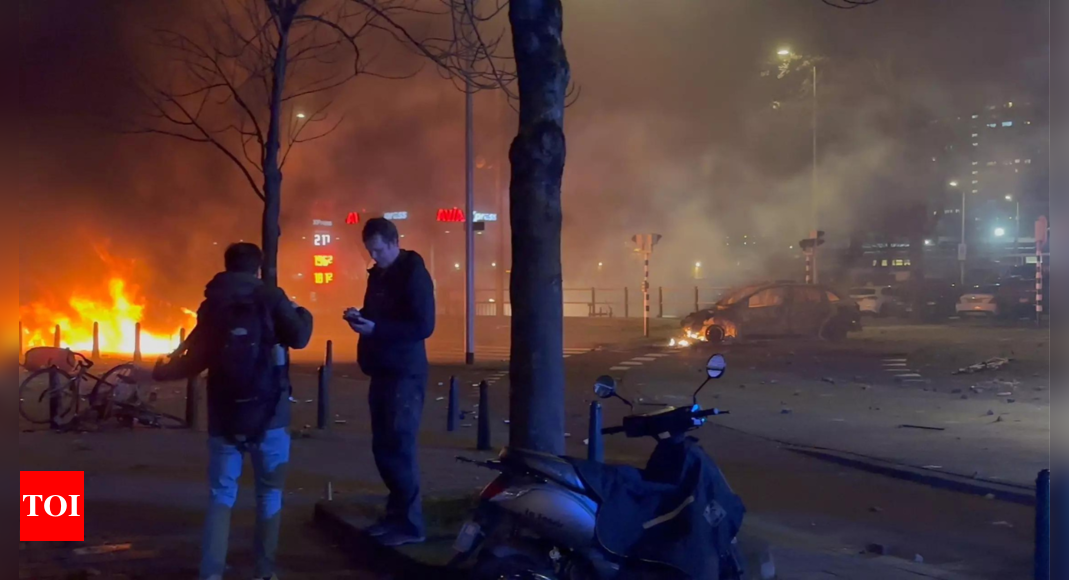 Netherlands riots: Police cars torched as rival groups of Eritreans clash