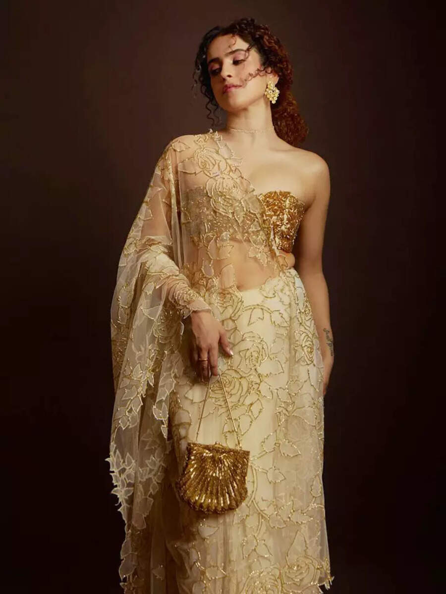 Sanya Malhotra looks like a 'Golden Goddess' in a dazzling gold and white  saree | Times of India