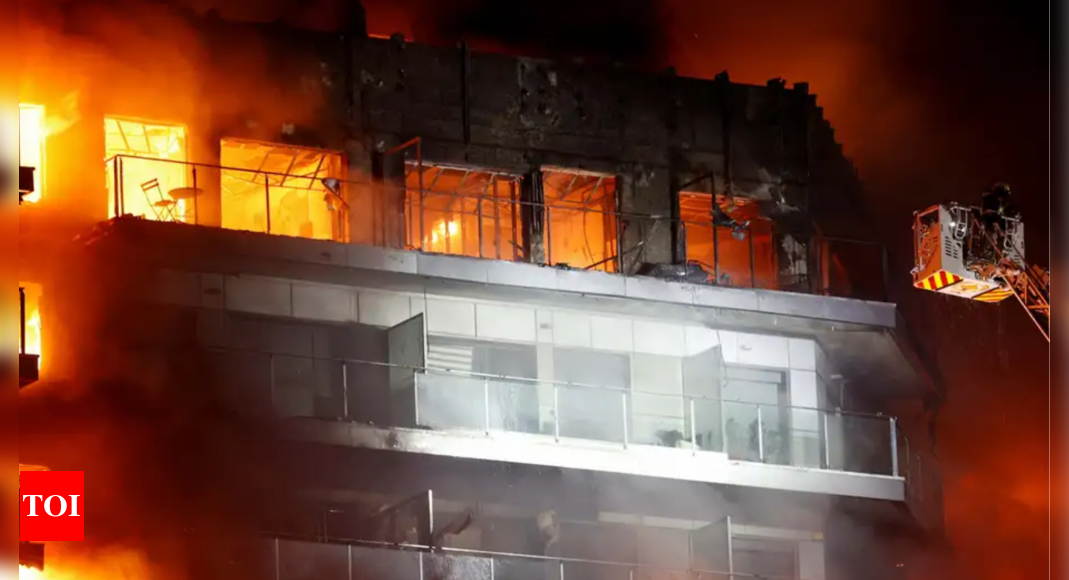 Fire engulfs high-rise apartment block in Valencia | World News – Times of India