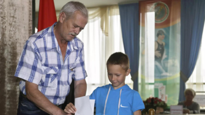 Belarusians vote in tightly controlled election amid opposition calls