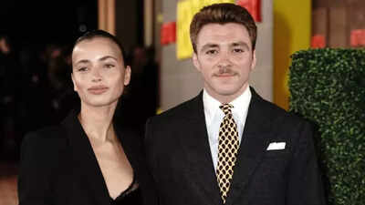 Madonna and Guy Ritchie's son Rocco steps out with girlfriend Olivia Monjardin for red carpet premiere