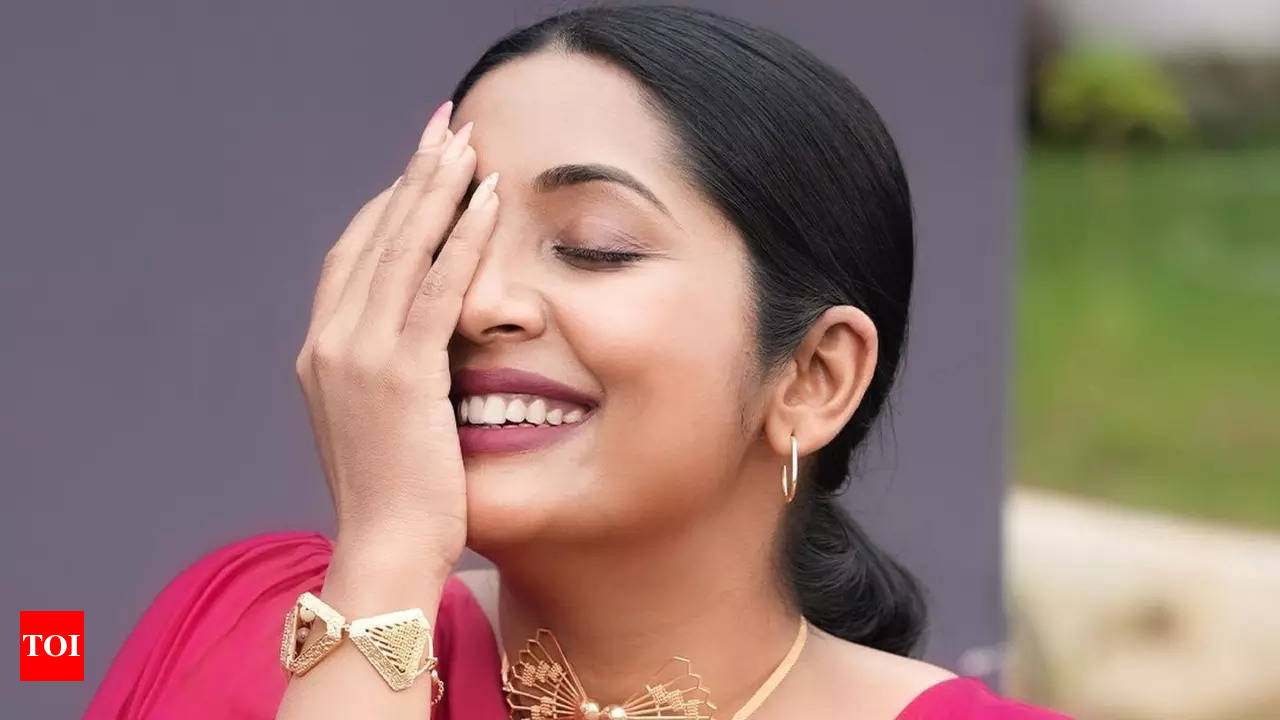 Navya Nair Embraces Childlike Wonder on Vacation | - Times of India