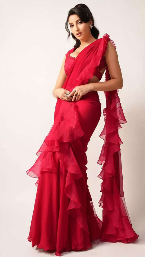 Nora Fatehi paints the town red in a dazzling ruffled saree | The Times of  India