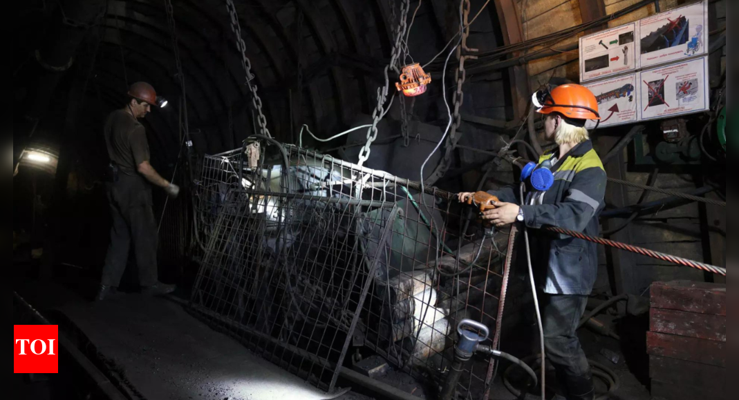 With men on the front, women descend Ukraine's mines - Times of India
