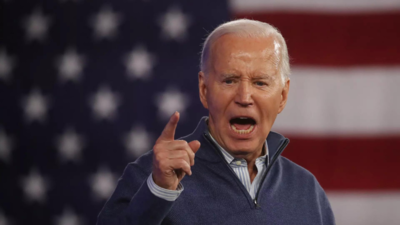 Biden signs a package of spending bills passed by Congress just hours before a shutdown deadline