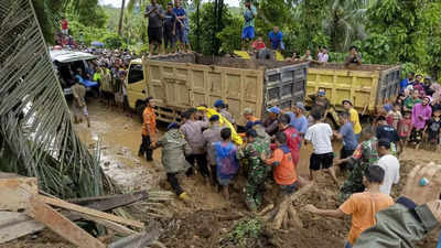 Indonesia flash floods and landslide reports at least 21 dead and several missing