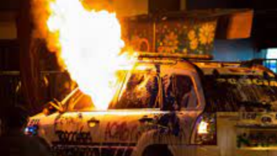 Protesters set fire to two patrol cars in southern Mexico