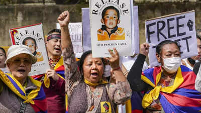 'China should leave Tibet:' Tibetans march near Parliament House to mark 65th uprising