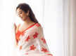 
Janhvi Kapoor goes retro in a timeless red and white floral-printed drape
