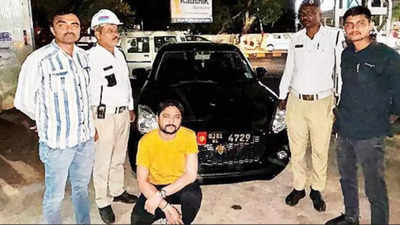 Bootlegger’s son drives car with police siren in Ahmedabad, arrested