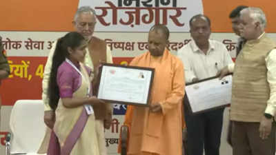 UP CM Yogi Adityanath hands over appointment letters to UPPSC appointees