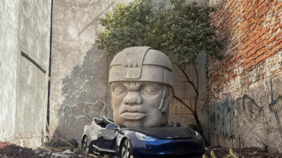 Massive stone head crushes Tesla in Mexico