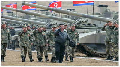 Kim Jong-un takes the helm: North Korean leader drives new tank in ...