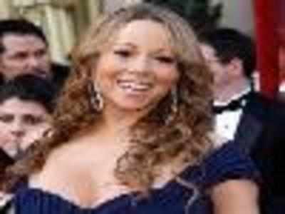 Mariah Carey teams up with John Legend