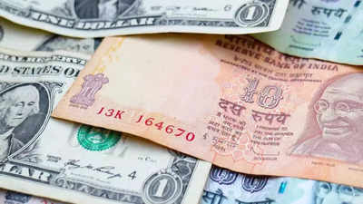 Rupee falls 4 paise to settle at 82.90 against dollar on firm crude oil prices