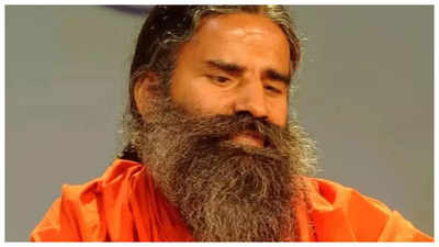 Patanjali misleading ads: SC issues showcause notice to Ramdev, asks him to appear before it