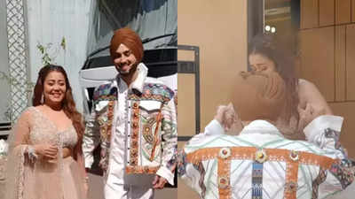 Rohanpreet Singh helps wife Neha Kakkar manage her lehenga on the sets of reality show; fans call him 'husband goals' - WATCH video