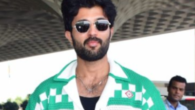 Vijay Deverakonda impresses with his airport look, dons white shirt with green highlights and black pants