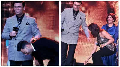 Karan Johar shares iconic photo of Varun Dhawan touching his feet; the actor hilariously responds to his 'Baap mat bana mujhe' comment