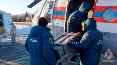Russian rescuers scramble to save 13 trapped under gold mine
