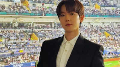 EXO's Baekhyun captivates audience with dual anthem performance at '2024 MLB World Tour: Seoul Series'