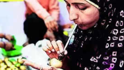Muslim families busy making gulal gota for Holi