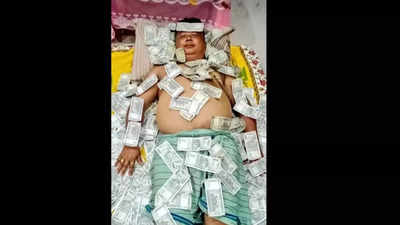 Sleeping on bed with stack of Rs 500 notes: Assam neta Benjamin Basumatary's photo goes viral