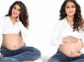 Aarti Chabria glows as she cradles baby bump