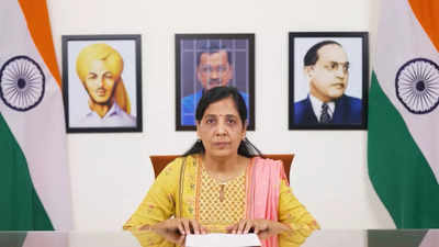 Photo of Arvind Kejriwal behind bars in background, wife Sunita reads husband's letter from Tihar