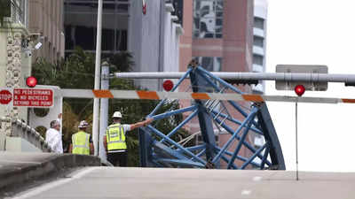 1 killed, 2 others hospitalized after crane section falls from a South Florida high-rise