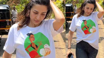 Malaika Arora rocks casual style in her doodle-printed t-shirt; the special appearance of her pet Casper is all things adorable - Pic