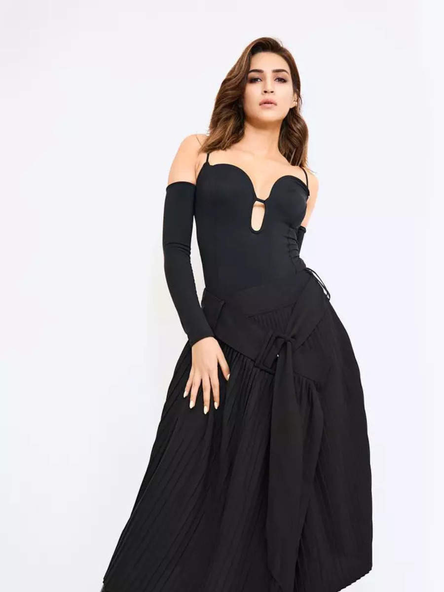 Kriti Sanon Ups The Glam Quotient In A Black Bodysuit And Pleated Skirt