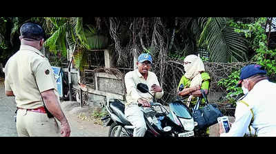 Nashik cops haul up riders without helmets