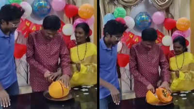 Ruined occasion or healthy alternative? Man cutting papaya instead of cake bemuses netizens