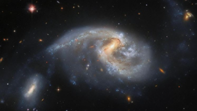 Nasa's Hubble telescope's latest image shows galaxies in 'cosmic interaction'