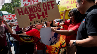 'China leave!': Philippine protesters trample on Xi Jinping's effigy