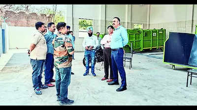 MC commissioner inspects work at static compactor site