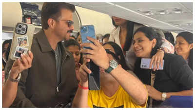 Anil Kapoor wins hearts as he graciously obliges fans with selfies on a flight; See pics
